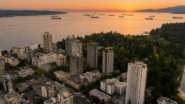 Aerial view of the West End and English Bay at sunset
